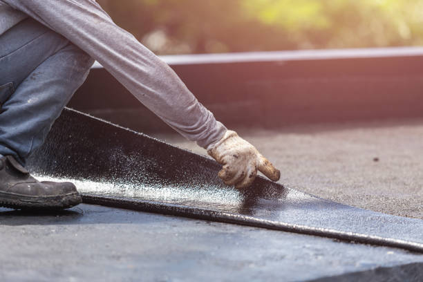 Professional Basement Waterproofing technician working in Miami, OK